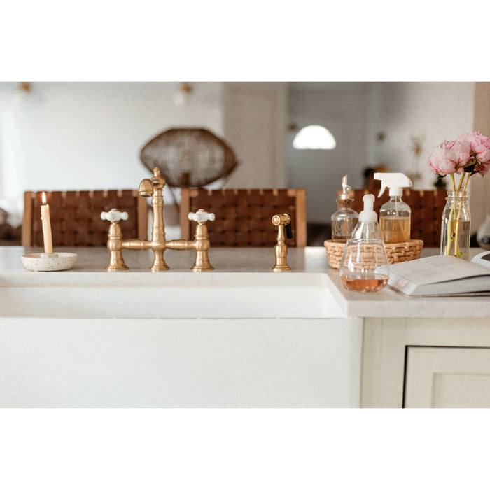 Kingston Tulare KS7277PXBS - English Country Two-Handle 4-Hole Deck Mount Bridge Kitchen Faucet with Brass Sprayer, Brushed Brass