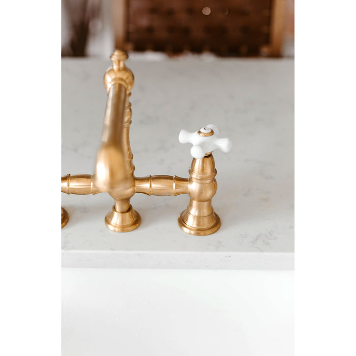Kingston Tulare KS7277PXBS - English Country Two-Handle 4-Hole Deck Mount Bridge Kitchen Faucet with Brass Sprayer, Brushed Brass