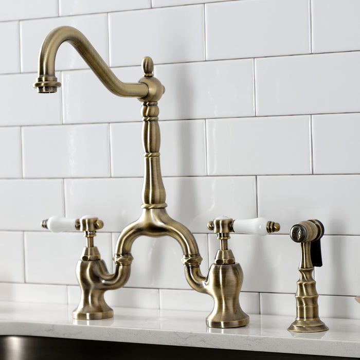 Kingston Heirloom KS7753BPLBS - Bel-Air Two-Handle 3-Hole Deck Mount Bridge Kitchen Faucet with Brass Sprayer, Antique Brass