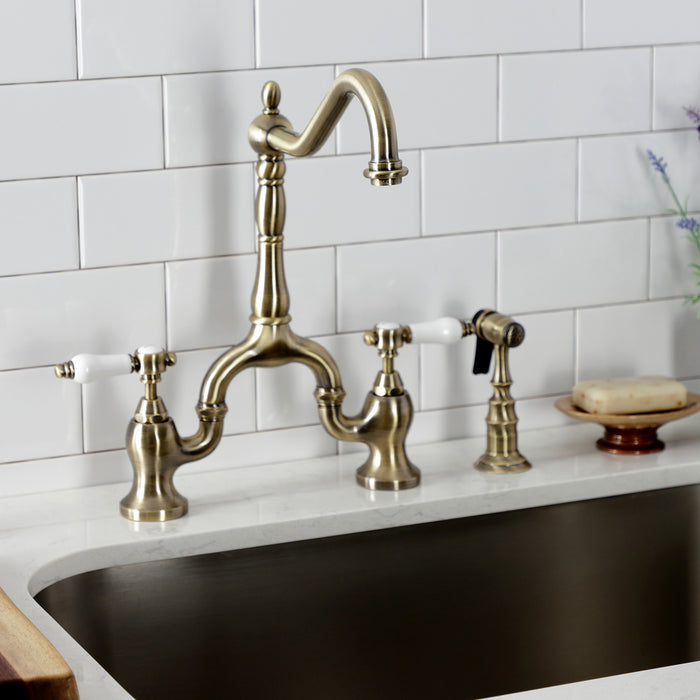 Kingston Heirloom KS7753BPLBS - Bel-Air Two-Handle 3-Hole Deck Mount Bridge Kitchen Faucet with Brass Sprayer, Antique Brass