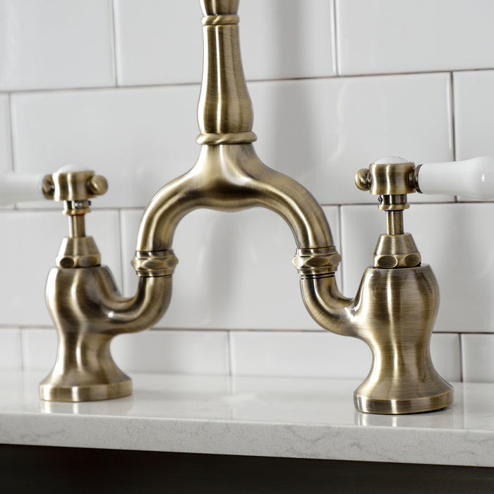 Kingston Heirloom KS7753BPLBS - Bel-Air Two-Handle 3-Hole Deck Mount Bridge Kitchen Faucet with Brass Sprayer, Antique Brass