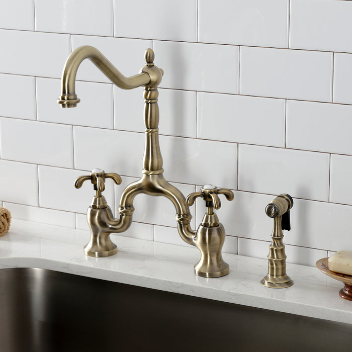 Kingston Heirloom KS7753TXBS - French Country Two-Handle 3-Hole Deck Mount Bridge Kitchen Faucet with Brass Sprayer, Antique Brass
