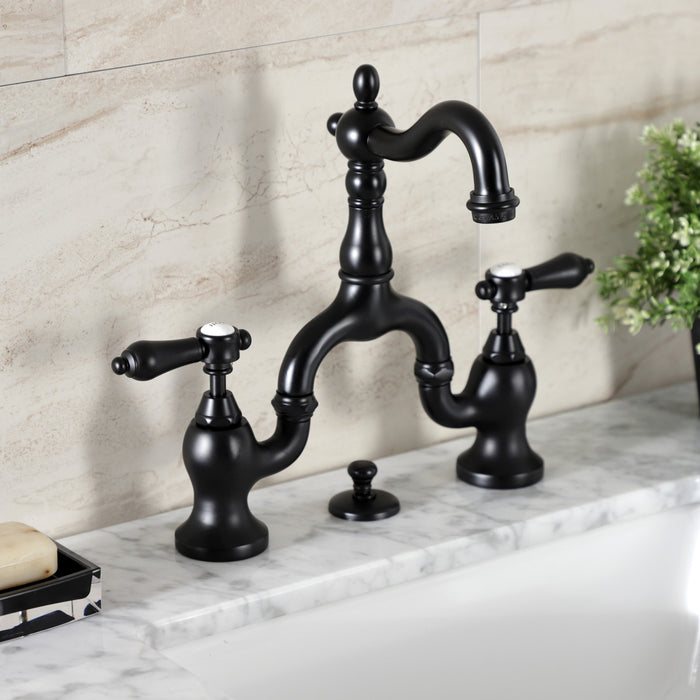 Kingston Heirloom KS7970BAL - Heirloom Two-Handle 3-Hole Deck Mount Bridge Bathroom Faucet with Brass Pop-Up, Matte Black