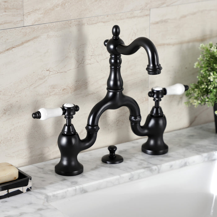 Kingston Heirloom KS7970BPL - Bel-Air Two-Handle 3-Hole Deck Mount Bridge Bathroom Faucet with Brass Pop-Up, Matte Black