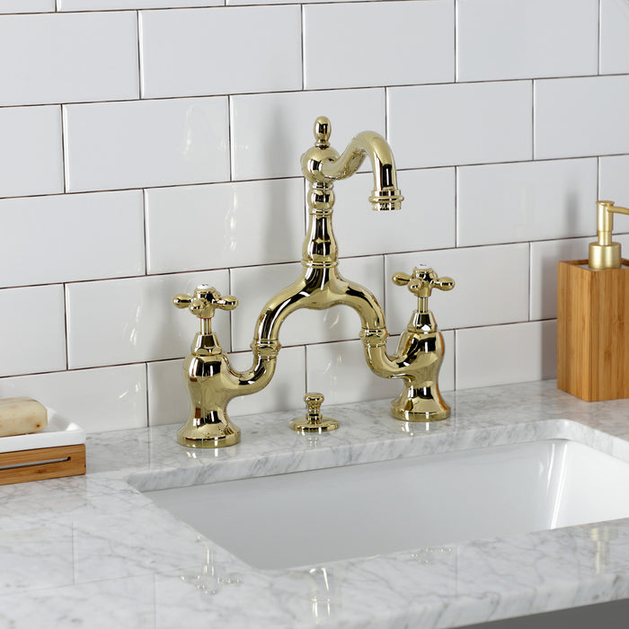 Kingston Heirloom KS7972AX - English Country Two-Handle 3-Hole Deck Mount Bridge Bathroom Faucet with Brass Pop-Up, Polished Brass