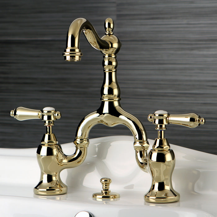 Kingston Heirloom KS7972BAL - Heirloom Two-Handle 3-Hole Deck Mount Bridge Bathroom Faucet with Brass Pop-Up, Polished Brass