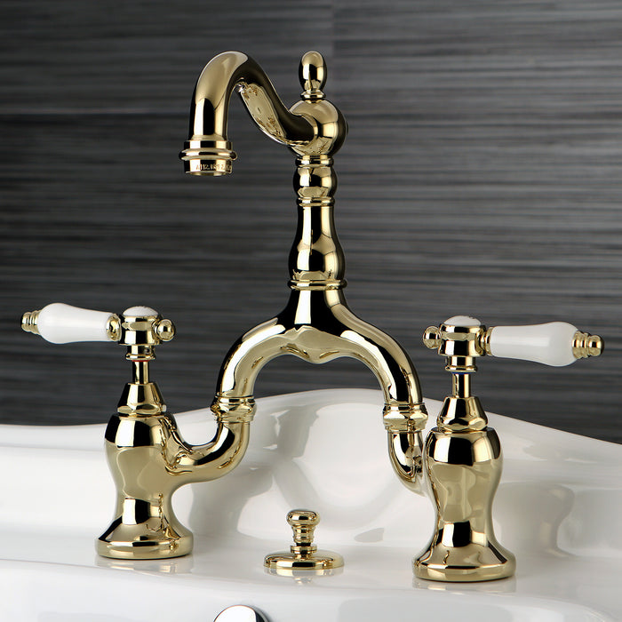 Kingston Heirloom KS7972BPL - Bel-Air Two-Handle 3-Hole Deck Mount Bridge Bathroom Faucet with Brass Pop-Up, Polished Brass