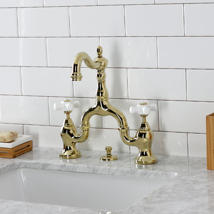 Kingston Heirloom KS7972PX - English Country Two-Handle 3-Hole Deck Mount Bridge Bathroom Faucet with Brass Pop-Up, Polished Brass
