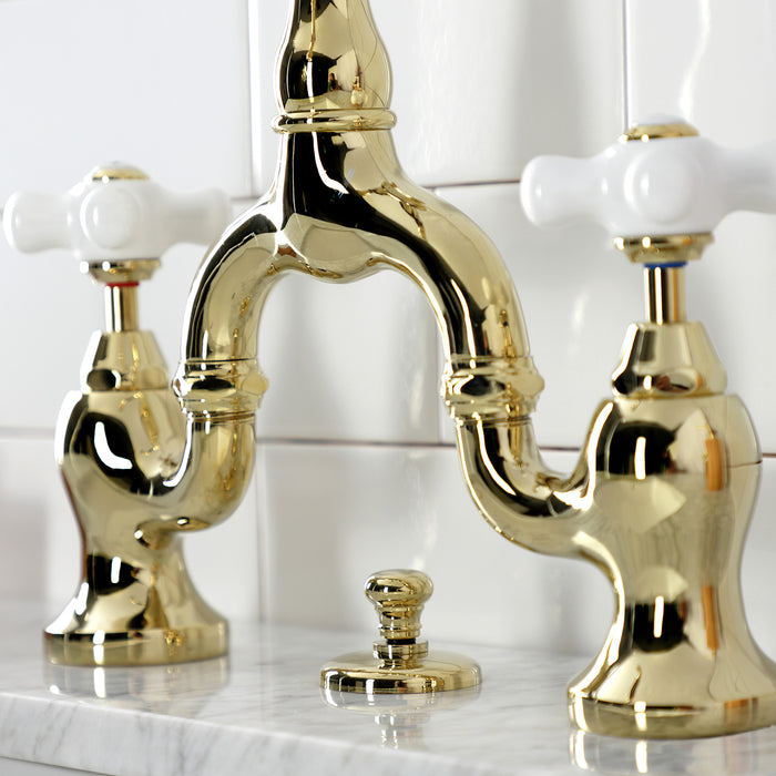 Kingston Heirloom KS7972PX - English Country Two-Handle 3-Hole Deck Mount Bridge Bathroom Faucet with Brass Pop-Up, Polished Brass