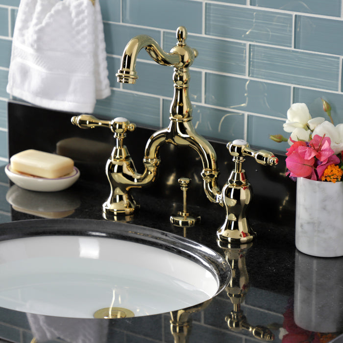 Kingston Heirloom KS7972TAL - Tudor Two-Handle 3-Hole Deck Mount Bridge Bathroom Faucet with Brass Pop-Up, Polished Brass