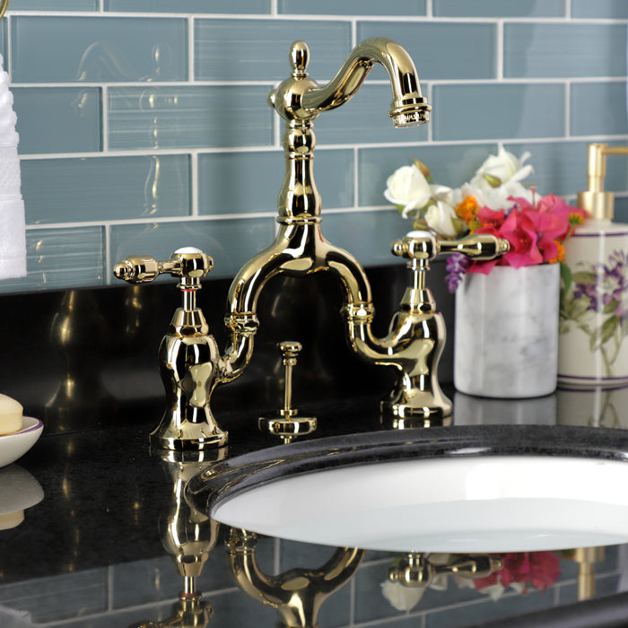 Kingston Heirloom KS7972TAL - Tudor Two-Handle 3-Hole Deck Mount Bridge Bathroom Faucet with Brass Pop-Up, Polished Brass