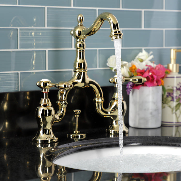 Kingston Heirloom KS7972TAL - Tudor Two-Handle 3-Hole Deck Mount Bridge Bathroom Faucet with Brass Pop-Up, Polished Brass