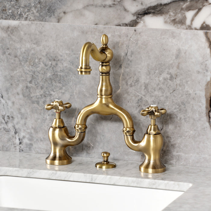 Kingston Heirloom KS7973AX - English Country Two-Handle 3-Hole Deck Mount Bridge Bathroom Faucet with Brass Pop-Up, Antique Brass