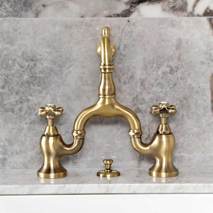 Kingston Heirloom KS7973AX - English Country Two-Handle 3-Hole Deck Mount Bridge Bathroom Faucet with Brass Pop-Up, Antique Brass