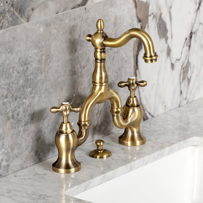 Kingston Heirloom KS7973AX - English Country Two-Handle 3-Hole Deck Mount Bridge Bathroom Faucet with Brass Pop-Up, Antique Brass