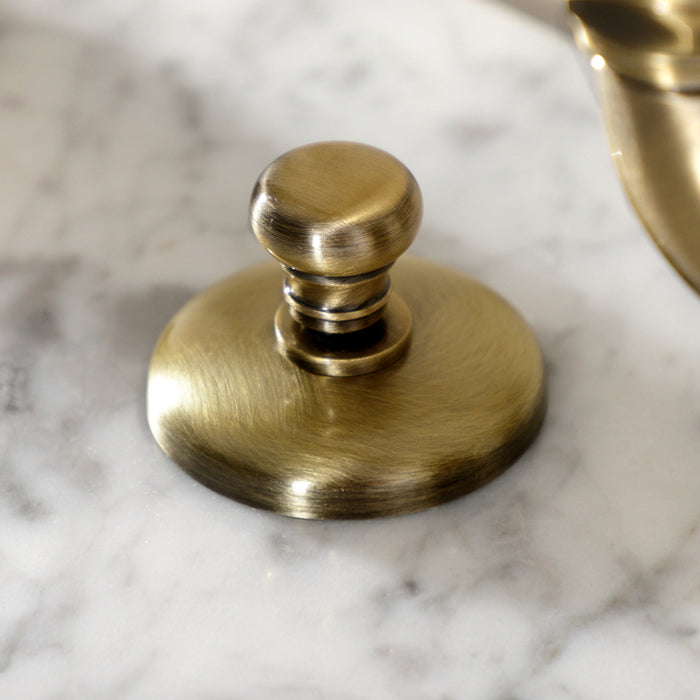 Kingston Heirloom KS7973TX - French Country Two-Handle 3-Hole Deck Mount Bridge Bathroom Faucet with Brass Pop-Up, Antique Brass