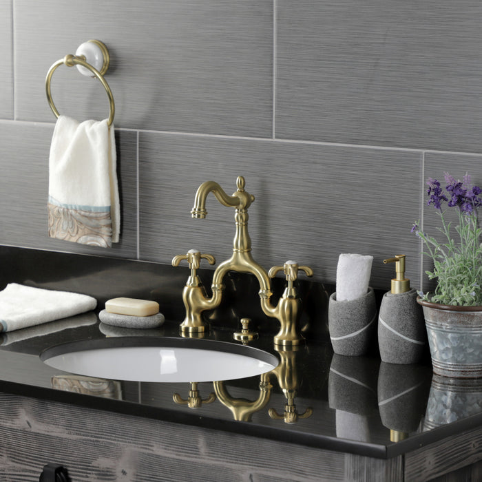 Kingston Heirloom KS7977TX - French Country Two-Handle 3-Hole Deck Mount Bridge Bathroom Faucet with Brass Pop-Up, Brushed Brass