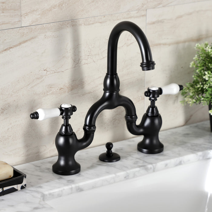 Kingston Heirloom KS7990BPL - Bel-Air Two-Handle 3-Hole Deck Mount Bridge Bathroom Faucet with Brass Pop-Up, Matte Black