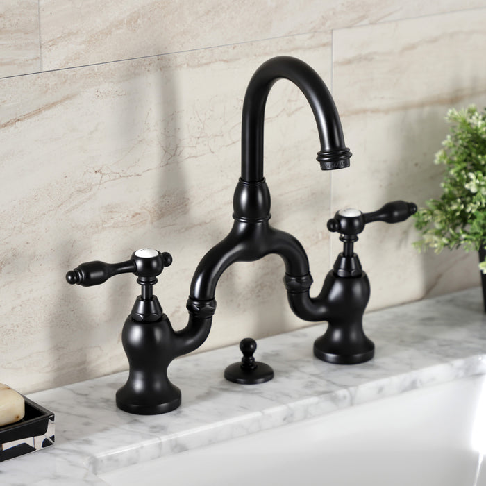 Kingston Heirloom KS7990TAL - Tudor Two-Handle 3-Hole Deck Mount Bridge Bathroom Faucet with Brass Pop-Up, Matte Black