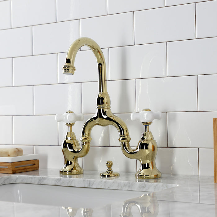 Kingston Heirloom KS7992PX - English Country Two-Handle 3-Hole Deck Mount Bridge Bathroom Faucet with Brass Pop-Up, Polished Brass