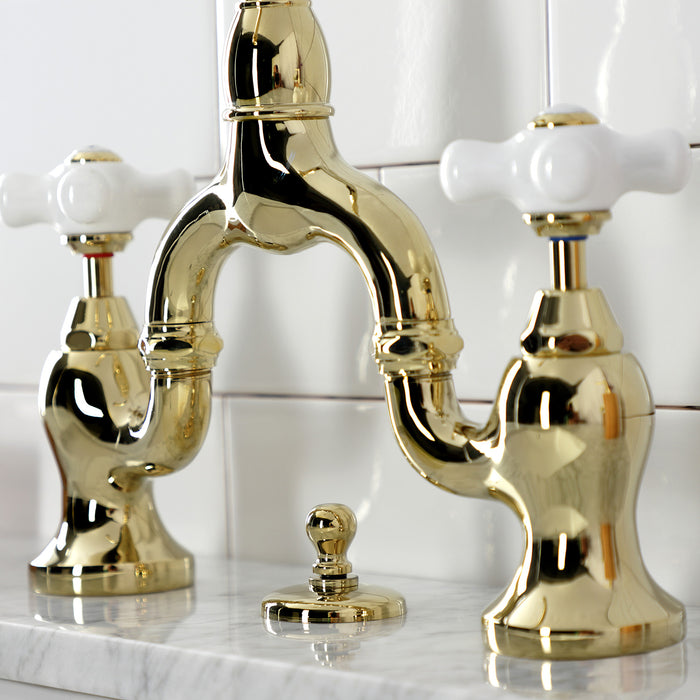 Kingston Heirloom KS7992PX - English Country Two-Handle 3-Hole Deck Mount Bridge Bathroom Faucet with Brass Pop-Up, Polished Brass