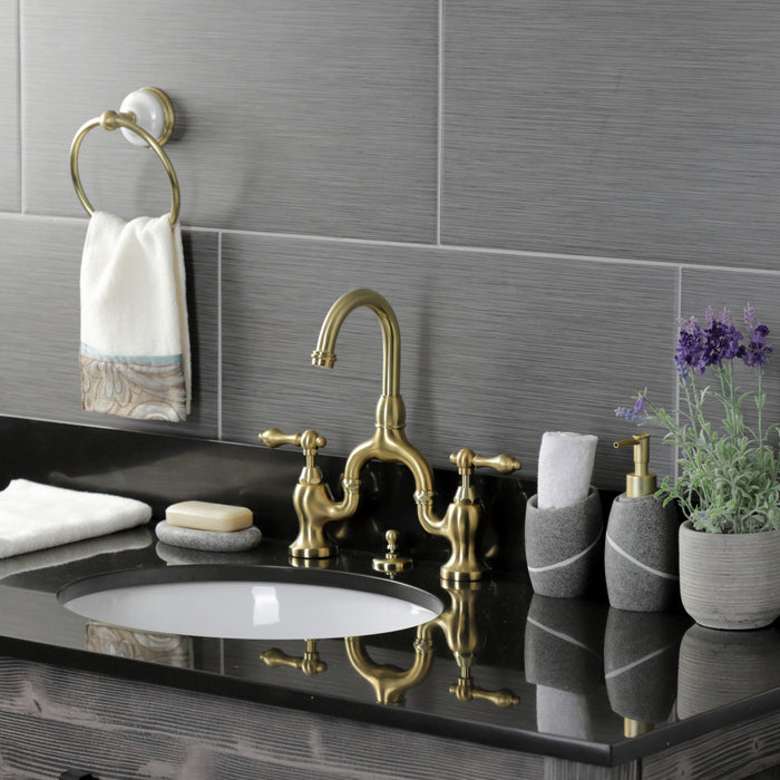 Kingston Heirloom KS7997AL - English Country Two-Handle 3-Hole Deck Mount Bridge Bathroom Faucet with Brass Pop-Up, Brushed Brass