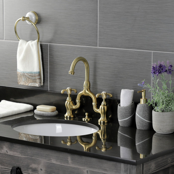 Kingston Heirloom KS7997TX - French Country Two-Handle 3-Hole Deck Mount Bridge Bathroom Faucet with Brass Pop-Up, Brushed Brass