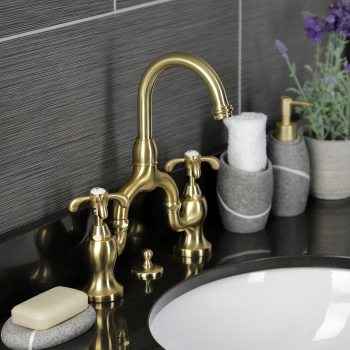 Kingston Heirloom KS7997TX - French Country Two-Handle 3-Hole Deck Mount Bridge Bathroom Faucet with Brass Pop-Up, Brushed Brass