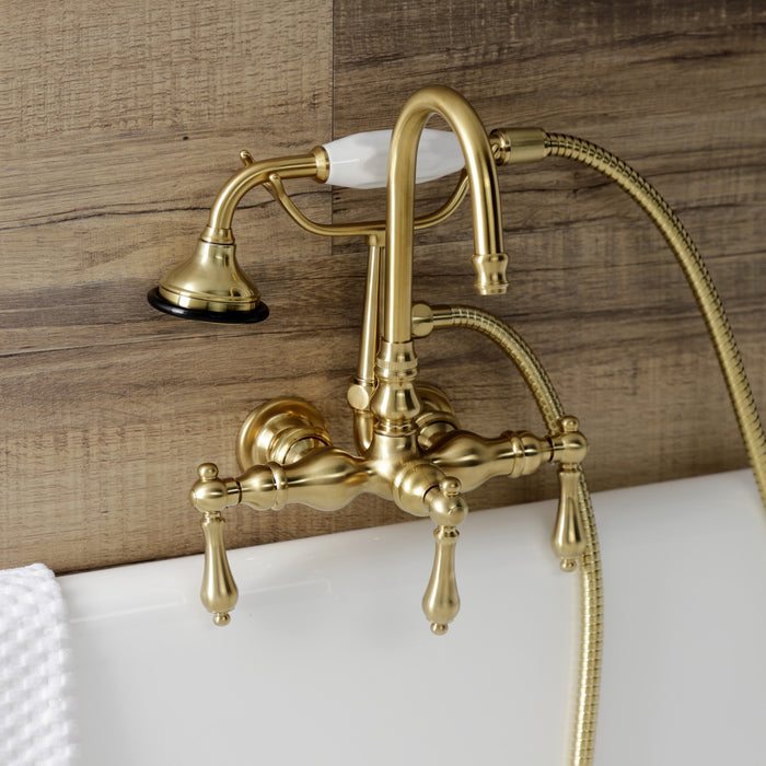 Kingston Heirloom AE7T7 - Aqua Vintage Three-Handle 2-Hole Tub Wall Mount Clawfoot Tub Faucet with Hand Shower, Brushed Brass