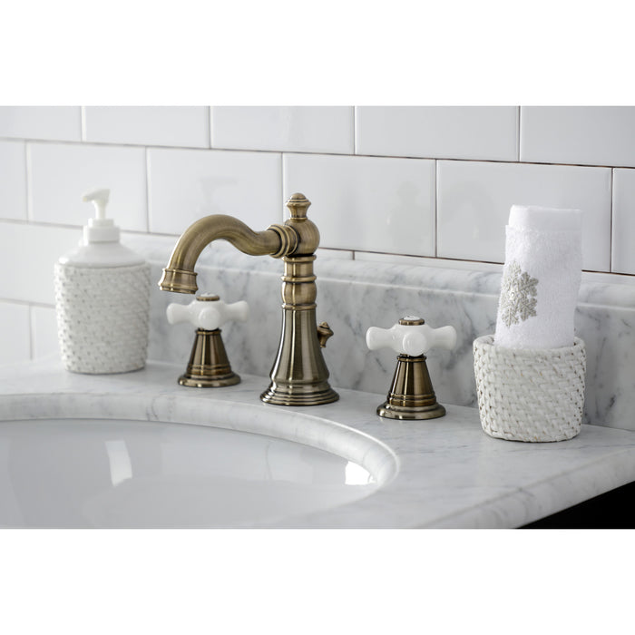 Kingston Heirloom FSC19733APX - American Classic Two-Handle 3-Hole Deck Mount Widespread Bathroom Faucet with Brass Pop-Up, Antique Brass