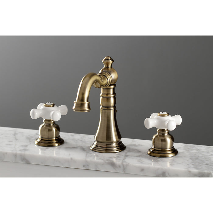 Kingston Heirloom FSC19733PX - American Classic Two-Handle 3-Hole Deck Mount Widespread Bathroom Faucet with Brass Pop-Up, Antique Brass