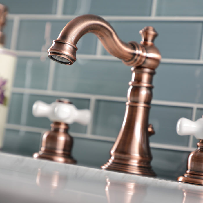 Kingston Heirloom FSC197PXAC - American Classic Two-Handle 3-Hole Deck Mount Widespread Bathroom Faucet with Brass Pop-Up, Antique Copper