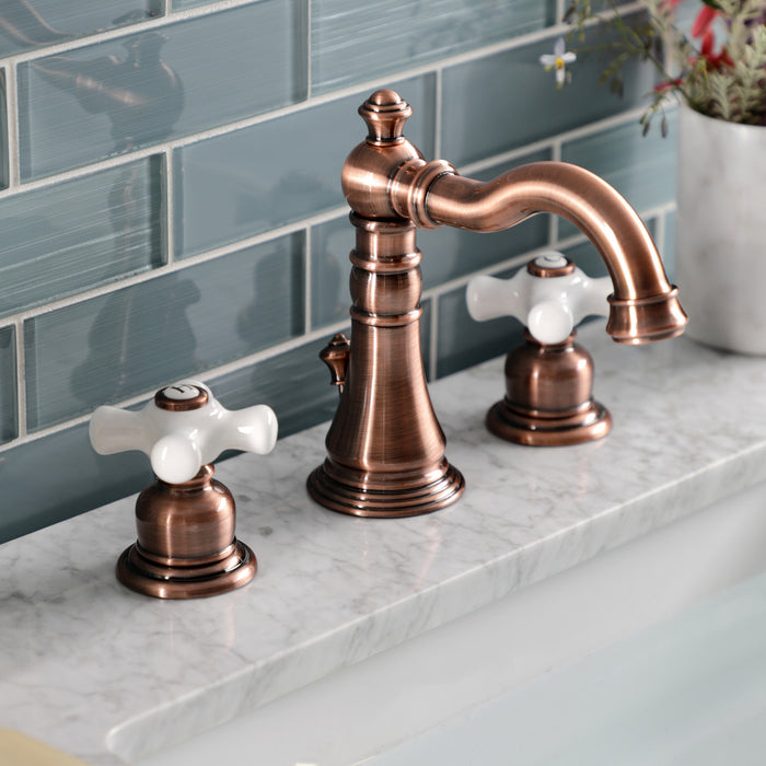 Kingston Heirloom FSC197PXAC - American Classic Two-Handle 3-Hole Deck Mount Widespread Bathroom Faucet with Brass Pop-Up, Antique Copper