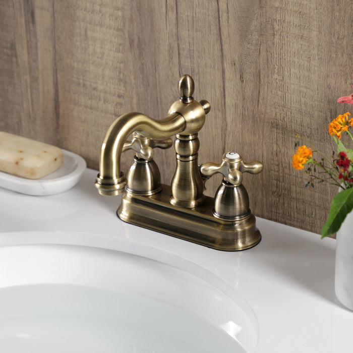 Heritage KB1603AX Two-Handle 3-Hole Deck Mount 4" Centerset Bathroom Faucet with Plastic Pop-Up, Antique Brass