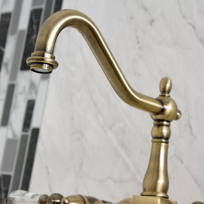 Wilshire KS1243WLLBS Two-Handle 3-Hole Wall Mount Bridge Kitchen Faucet with Brass Sprayer, Antique Brass