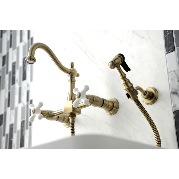 Heritage KS1263PXBS Two-Handle 2-Hole Wall Mount Bridge Kitchen Faucet with Brass Sprayer, Antique Brass