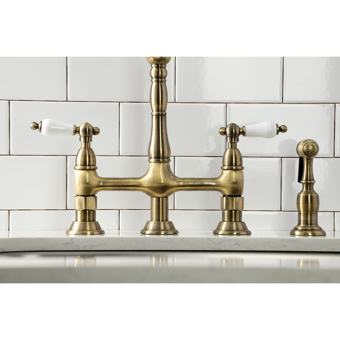 Heritage KS1273PLBS Two-Handle 4-Hole Deck Mount Bridge Kitchen Faucet with Brass Sprayer, Antique Brass