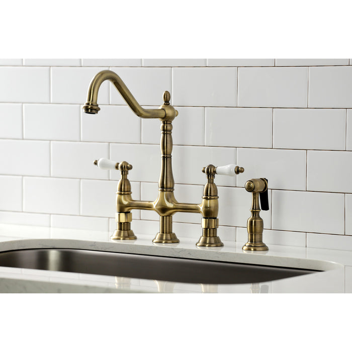 Heritage KS1273PLBS Two-Handle 4-Hole Deck Mount Bridge Kitchen Faucet with Brass Sprayer, Antique Brass