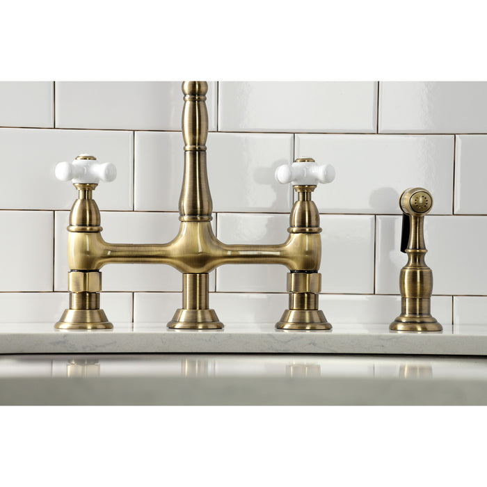 Kingston Heirloom KS1273PXBS - Heritage Two-Handle 4-Hole Deck Mount Bridge Kitchen Faucet with Brass Sprayer, Antique Brass