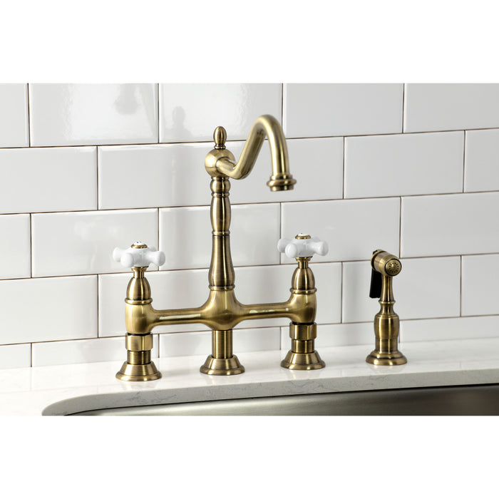 Kingston Heirloom KS1273PXBS - Heritage Two-Handle 4-Hole Deck Mount Bridge Kitchen Faucet with Brass Sprayer, Antique Brass