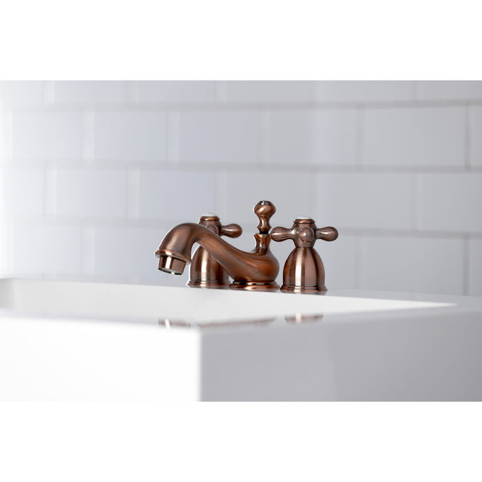 Kingston Heirloom KS395AXAC - Restoration Two-Handle 3-Hole Deck Mount Mini-Widespread Bathroom Faucet with Brass Pop-Up, Antique Copper