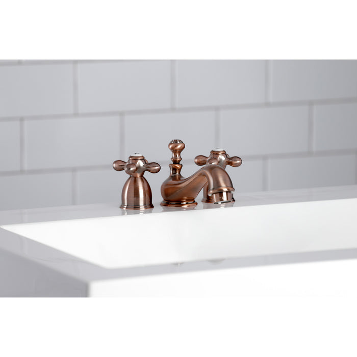 Kingston Heirloom KS395AXAC - Restoration Two-Handle 3-Hole Deck Mount Mini-Widespread Bathroom Faucet with Brass Pop-Up, Antique Copper