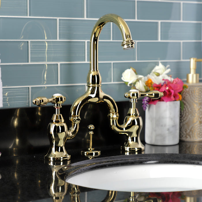 Tudor KS7992TAL Two-Handle 3-Hole Deck Mount Bridge Bathroom Faucet with Brass Pop-Up, Polished Brass