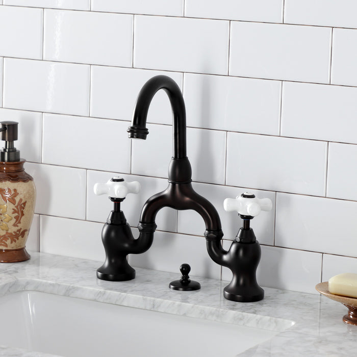 Kingston Heirloom KS7995PX - English Country Two-Handle 3-Hole Deck Mount Bridge Bathroom Faucet with Brass Pop-Up, Oil Rubbed Bronze