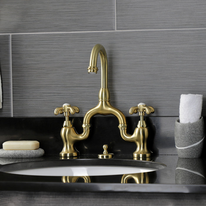 Kingston Heirloom KS7997TX - French Country Two-Handle 3-Hole Deck Mount Bridge Bathroom Faucet with Brass Pop-Up, Brushed Brass